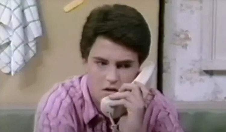 Matthew Perry's Charles Russell talks on a phone in Second Chance