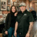 Migraine-free since the switch to sake, says Michelle pictured here with Albert, at Reverie in Roseburg. (Photo by Sierra and Isaiah Miller)