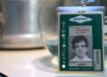 Ethan Slater's Thomas Godolkin on a Vought identity card on Gen V