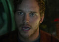 Chris Pratt as Star-Lord is seen in closeup standing on his ship in Guardians of the Galaxy