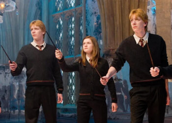 All three actors played siblings in the Weasley family (Warner Bros)