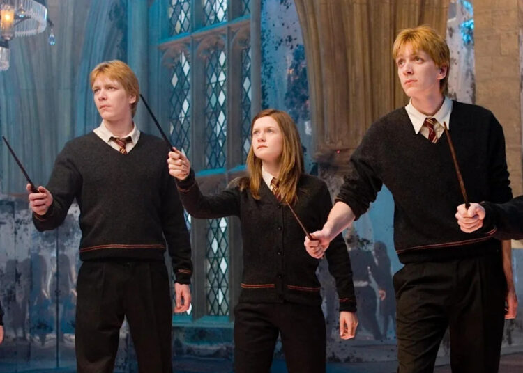 All three actors played siblings in the Weasley family (Warner Bros)