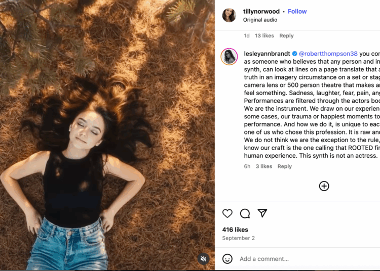 An instagram post by Tilly Norwood, an AI generated creationg, showing a young bot-made woman laying on a forest floor. The comment on the post is critical of the account being of a bot-made woman who doesn't exist.