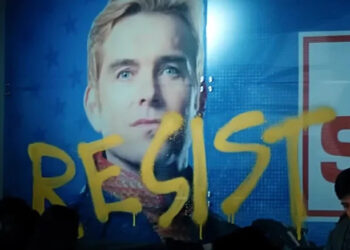 Gen V - poster of Homelander with "resist" painted on it