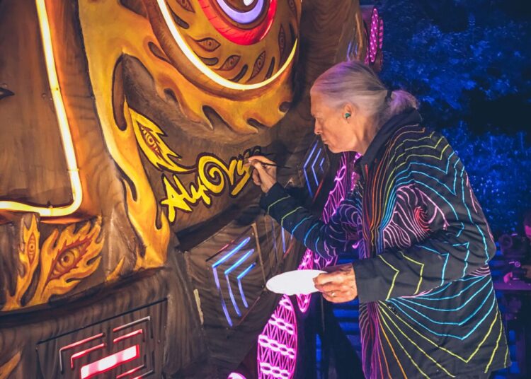 Pablo González Vargas painting the new Mayan Warrior art car.