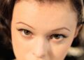 Scarlett White in a beauty look inspired by June Cash. Wearing PermaGel Ultra Glide Eye Pencil in Shade.