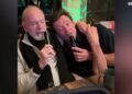Hugh Jackman and Neil Diamond perform famous love song in sweet karaoke video