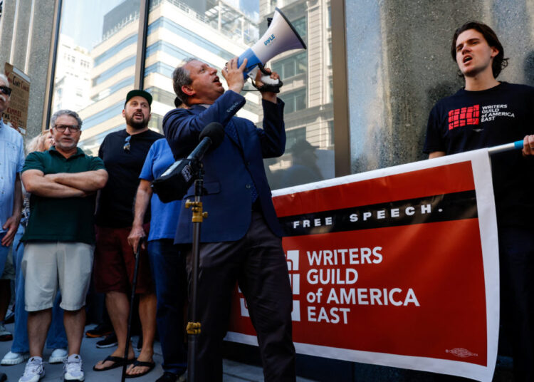 People rally in front of ABC Studios to protest "Jimmy Kimmel Live!" being taken off the air, in New York