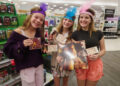 Huntsville Swifties gather in glitter and feathers to celebrate TS12 release