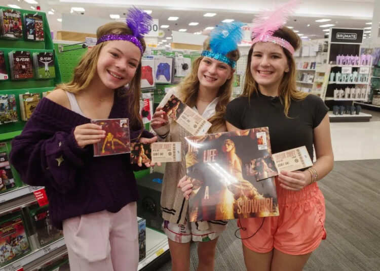 Huntsville Swifties gather in glitter and feathers to celebrate TS12 release