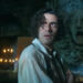 Oscar Isaac's Victor Frankenstein looking up in horror as lightning flashes.