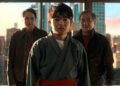 Ben Wang's Li Fong standing in the middle with Ralph Macchio and Jackie Chan behind him with NYC behind them in Karate Kid: Legends.