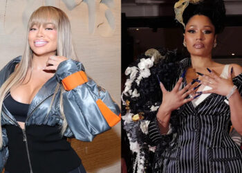 Latto in a stylish jacket with long blonde hair, and Nicki Minaj in a pinstripe outfit with an elaborate floral accessory.