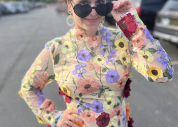 Enquirer education reporter Madeline Mitchell modeled her Eras Tour outfit after the dress Taylor Swift wore to the 63rd annual Grammy Awards. Swift won album of the year for "Folklore" that year.