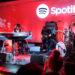 D'Angelo (L), American R&B and neo soul singer-songwriter, plays for reporters at a Spotify news conference May 20, 2015 in New York.