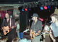 Bruce Springsteen joins Pittsburgh rockers Joe Grushecky, left, and The Houserockers for a guest performance at the Stone Pony music club in Asbury Park, N.J., on October 17, 1995. Springsteen was helping to promote Grushecky's new album "American Babylon."