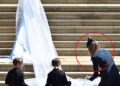 One particularly resounding absence was Meghan's Maid of Honour - traditionally a bride's most trusted confidante. Instead, it was the designer of Meghan's Audrey Hepburn-inspired floor-length gown, Clare Waight Keller, that 'stepped in' to assist her (pictured right)