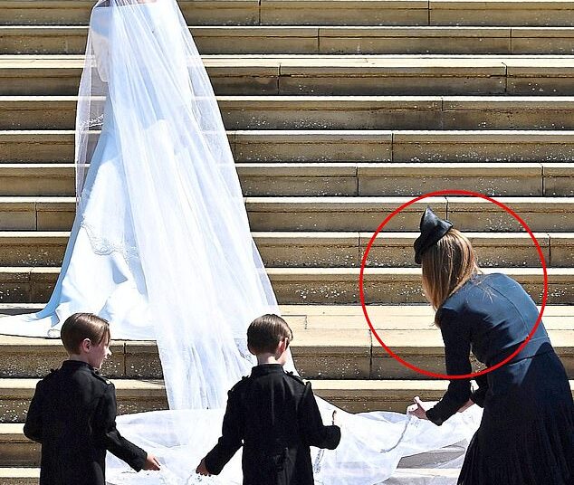 One particularly resounding absence was Meghan's Maid of Honour - traditionally a bride's most trusted confidante. Instead, it was the designer of Meghan's Audrey Hepburn-inspired floor-length gown, Clare Waight Keller, that 'stepped in' to assist her (pictured right)