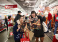 Fans buy Taylor Swift's new album, "The Life of a Showgirl," at Target on October 2, 2025 in New York City.