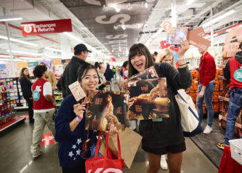 Fans buy Taylor Swift's new album, "The Life of a Showgirl," at Target on October 2, 2025 in New York City.