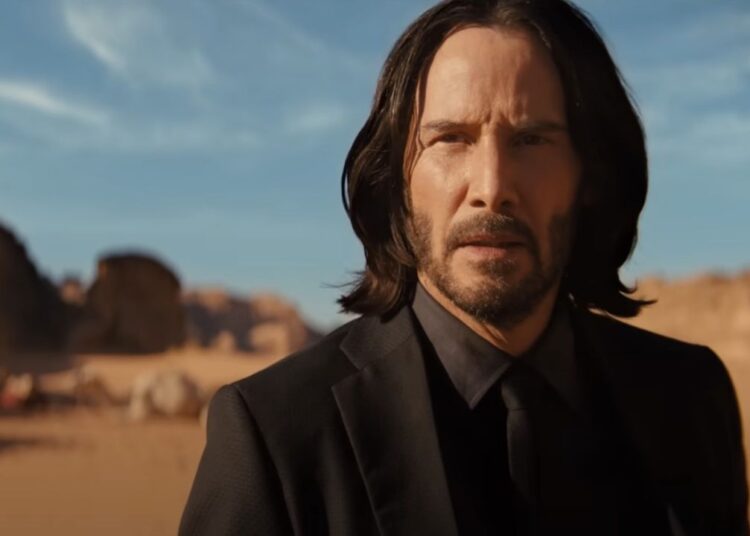 Keanu Reeves as John Wick in the desert in Chapter 4.