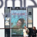 Taylor Swift's "The Life of a Showgirl" is advertised outside of an AMC theater.