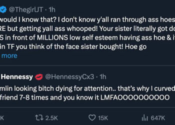 A tweet exchange between JT and Hennessy, featuring a heated argument with strong language and personal insults.