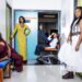 Victoire Charles, Bisserat Tseggai, Jordan Rice, and Claudia Logan, from left, of, "Jaja's African Hair Braiding."