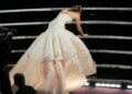 This Feb. 24, 2013, photo shows Jennifer Lawrence stumbling as she walks to the stage to accept the award for best actress in a leading role for "Silver Linings Playbook" during the Oscars at the Dolby Theatre in Los Angeles. (Photo by Chris Pizzello/Invision/AP, File)