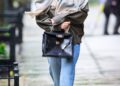 *exclusive* new york, ny jennifer lawrence braved the rain in a stylish oversized jacket layered over a light scarf, paired with high waisted jeans and black sneakers. carrying a black hermes birkin bag, she kept her look casual yet chic, with tousled hair and dark sunglasses as she walked through the windy streets of new york city. pictured: jennifer lawrence backgrid usa 13 october 2025 byline must read: diamond / backgrid usa: +1 310 798 9111 / usasales@backgrid.com uk: +44 208 344 2007 / uksales@backgrid.com *uk clients pictures containing children please pixelate face prior to publication*