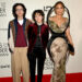 Jennifer Lopez, right, poses with kids Max, right, and Emme, center, on the "Kiss of the Spider Woman" red carpet in New York on Oct. 6.