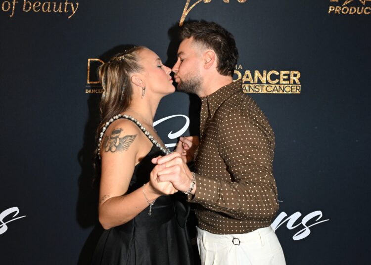 JoJo Siwa and Chris Hughes Make PDA-Packed Red Carpet Debut Amid Relationship Scrutiny – Star Magazine