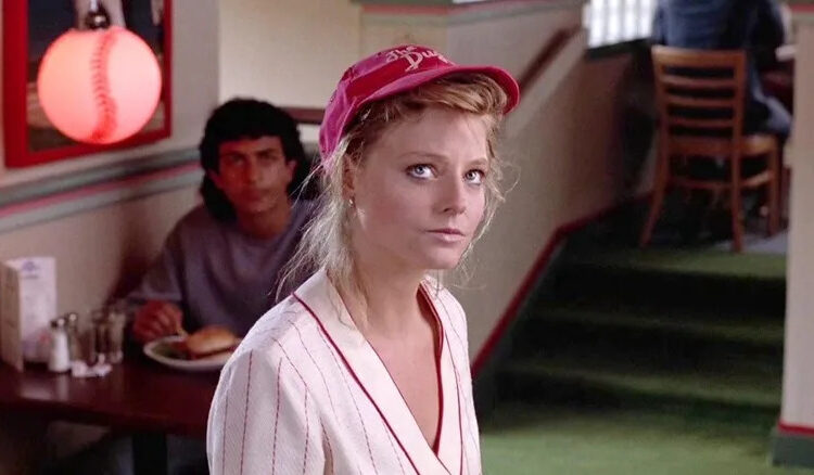 Jodie Foster as Sarah Tobias wearing a baseball cap in The Accused