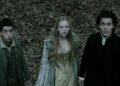 Masbath, Katrina, and Ichabod looking up in alarm in Sleepy Hollow