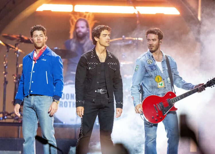 The Jonas Brothers perform in Des Moines, Iowa, on Oct. 5, 2025, as part of their Jonas 20: Greetings from Your Hometown tour.