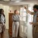 This image released by Amazon MGM Studios shows Ayo Edebiri, from left, Julia Roberts and director Luca Guadagnino on the set of