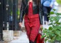 Katie Holmes was spotted in New York wearing tomato red ballet flats, a matching shirt dress, and black leggings