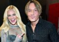 Keith Urban and Kelsea Ballerini smiling together backstage at a country music event, reflecting their close Nashville friendship amid his reported split.