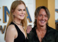 Keith Urban, right, and Nicole Kidman walk the red carpet during the 57th annual Country Music Association Awards in Nashville, Tennessee, on Nov. 8, 2023.
