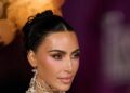 Kim Kardashian Continues Her Hairy Streak With a Braided Bra