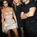 SEVENTY ONE Gin Kardashian rocked a sheer corset alongside a matching satin skirt, sheer white gloves and strappy heels.
