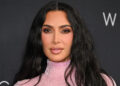 Kim Kardashian walks red carpet wearing pink dress