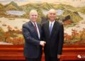 Andrew with Cai Qi, the alleged ‘spymaster’ at the heart of the collapsed China spy case