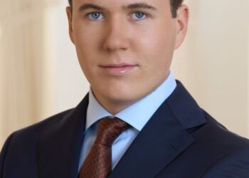 A portrait of Crown Prince Christian in a suit