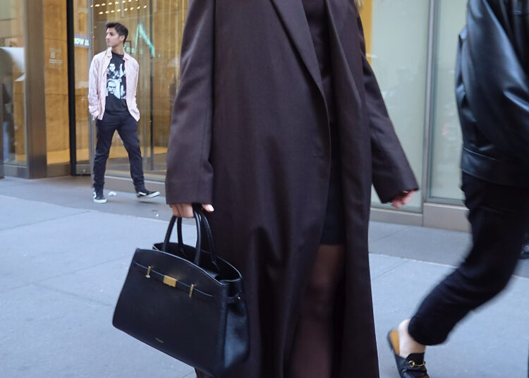Kristen Bell was spotted in New York promoting Nobody Wants This in brown ankle boots
