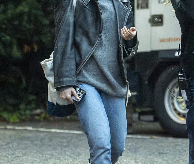 Lily Collins looked worlds away from her glamorous Emily in Paris character on the set of Close Personal Friends on Wednesday- after filming a drug scene for the new movie