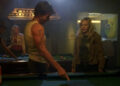 taylor Sheridan's Danny Boyd shows Kristen Bell's Veronica Mars a patch of blood on a pool table in a bar in Veronica Mars