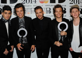 Zayn Malik, Harry Styles, Liam Payne, Louis Tomlinson and Niall Horan of One Direction, winners of the British Video and Global Success BRIT awards, pose in the winners' room at The BRIT Awards 2014 at 02 Arena on February 19, 2014 in London, England.