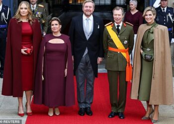 Ahead of the abdication ceremony on Friday, Luxembourg's Grand Duke Henri and Grand Duchess Maria Teresa pose for a picture with Dutch King Willem-Alexander, his wife Queen Maxima and their daughter, Princess Catharina-Amalia