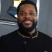 FILE - Malcolm-Jamal Warner arrives at the 65th annual Grammy Awards, Feb. 5, 2023, in Los Angeles. (Photo by Jordan Strauss/Invision/AP, File)